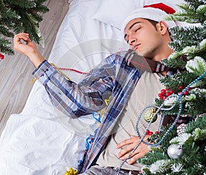 Man suffering hangover after christmas party