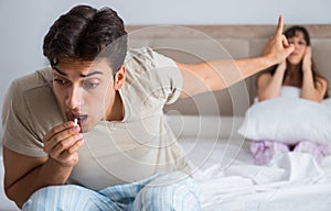 Man suffering from impotency with pill photo