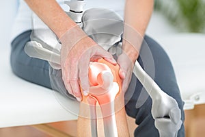 Man suffering with knee inflamation