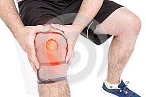 Man suffering with knee inflammation