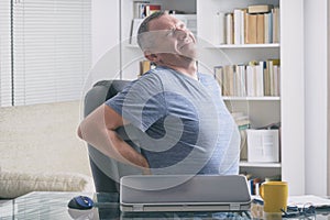 Man suffering from low back pain