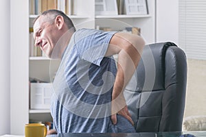 Man suffering from low back pain