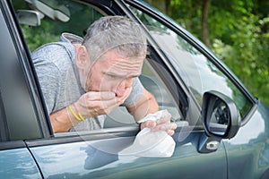 Man suffering from motion sickness