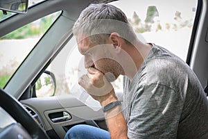 Man suffering from motion sickness photo