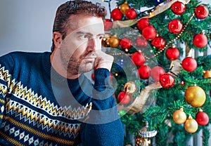 Man suffering negative emotions during christmas day