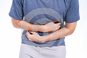 Man suffering from stomach pain and injury isolated white background. Health care and medical concept