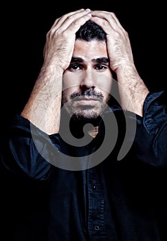 Man suffering stress isolated on black