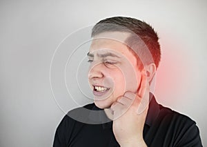 A man suffers from pain in the ear. The auditory meatus hurts due to otitis media, cerumen plug, ear boil, or trigeminal neuralgia