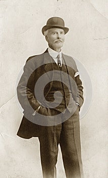 Man in Suit & Bowler Hat photo