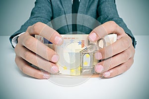 Man in suit with euro bills photo