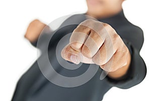 Man with suit fist punching isolated