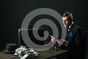 Man in suit. Mafia. Making money. Money transaction. Businessman work in accountant office. Small business concept photo