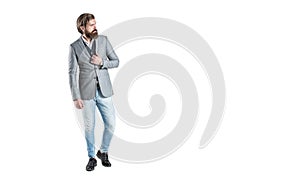 Man in suit. Male beard and mustache. Sexy male, brutal macho, hipster. Hand in with wrist watch in a business suit