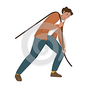A man in a suit is pulling something with a rope. Person manager in a pose pulling objects
