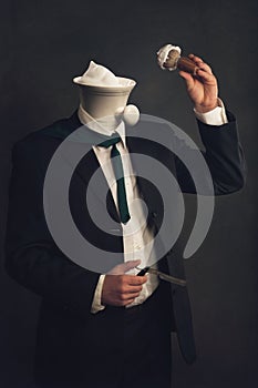 Man in suit with Razor, Bristle and shaving bowl