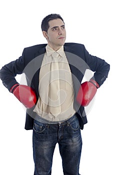 Man in suit with red boxing gloves on his hips