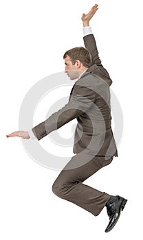 Man in suit sitting on empty space