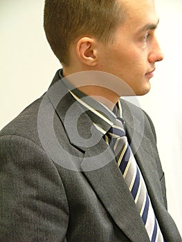 Man in suit and striped tie