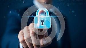 Man in suit touching blue lock with binary code background.