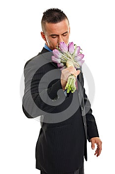 Man in suit with tulips