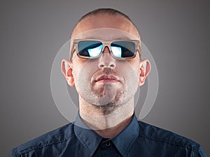 Man with sunglasses in a studio shot
