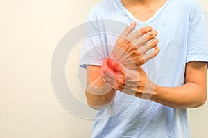 a man support a hand part that experiencing pain