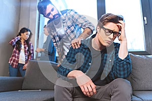 Man supporting his friend