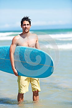 Man, surf and portrait for workout, training and waves with water sport and exercise outdoor of athlete. Surfer, freedom