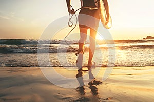 Man surfer runing in ocean with surfboard.  Close up legs image at Weligama beach,Sri Lanka