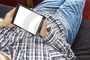 Man surfing on tablet computer
