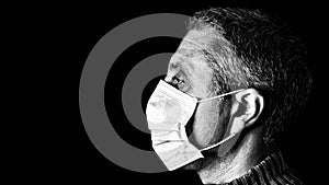 Man with surgical mask. Pandemic or epidemic and scary, fear or danger concept. Protection for biohazard like COVID-19 aka