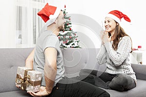 Man surprise girlfriend with christmas gift