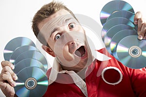 Man with surprised face an cd