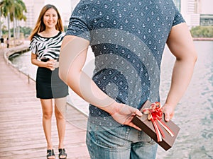 Man surprises his girlfriend by giving out a gift - love and rel