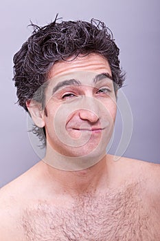 Man with suspicious or ignorant facial expression photo