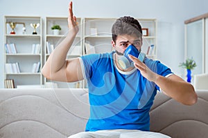 The man sweating excessively smelling bad at home