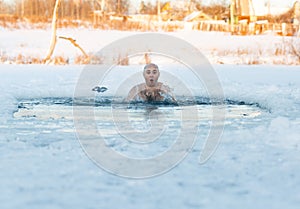 Man swimming cold water