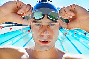 Man, swimming pool and prepare in portrait with goggles, cap or sport with exercise for wellness, health or fitness