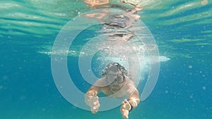 Man swimming underwater