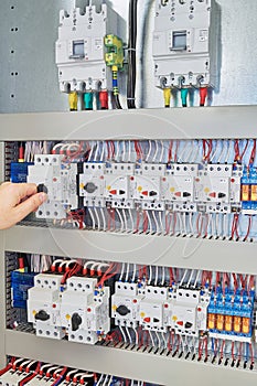 Man switch switch protection engine to check in the electrical Cabinet.