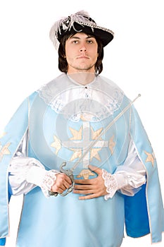 Man with a sword dressed as musketeer