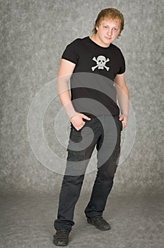 Man in a T-shirt with pirate symbolics photo