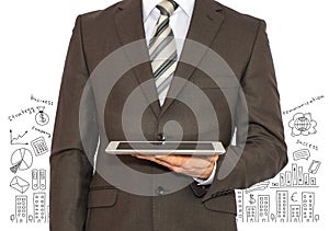 Man with tablet in hand and business sketches