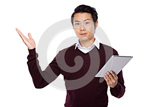 Man with tablet and hand show ith balnk sign