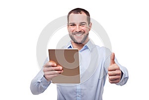 Man with tablet makes a gesture thumb up