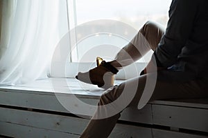 Man take a rest on windowsills photo