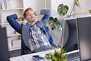 Man taking a break while working in an office