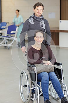 man taking care disable wife