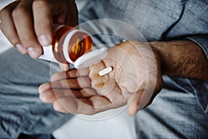 Man taking medication health care photo