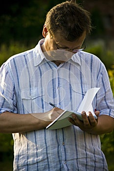 Man taking notes